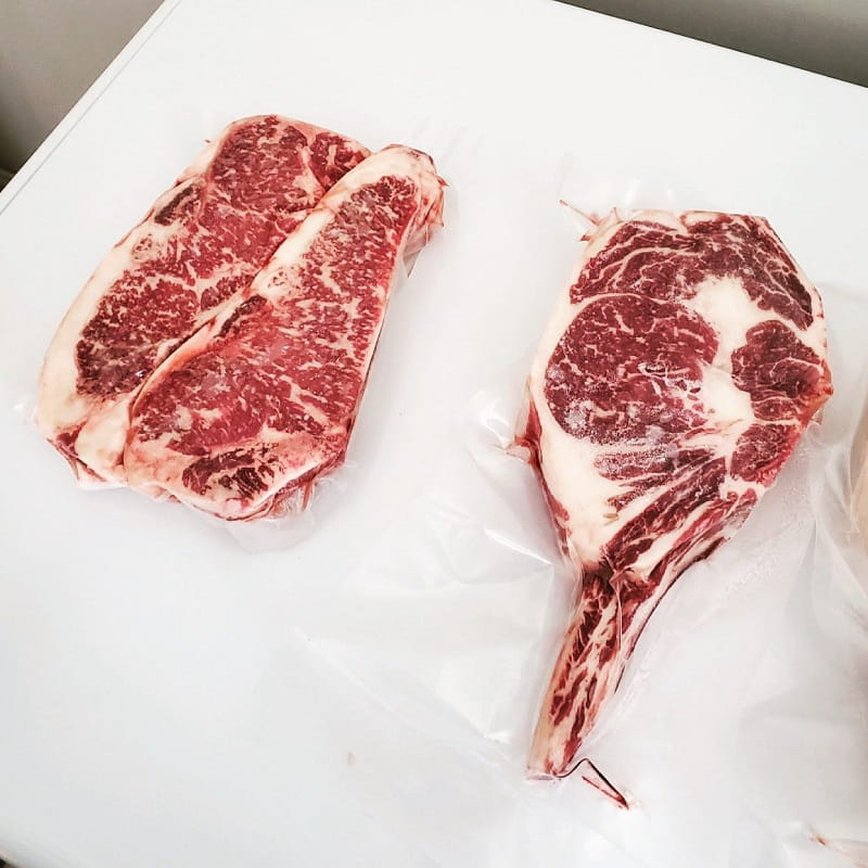 How Can You Ensure Your New York Strip Or Ribeye Steak Is Cooked To Perfection