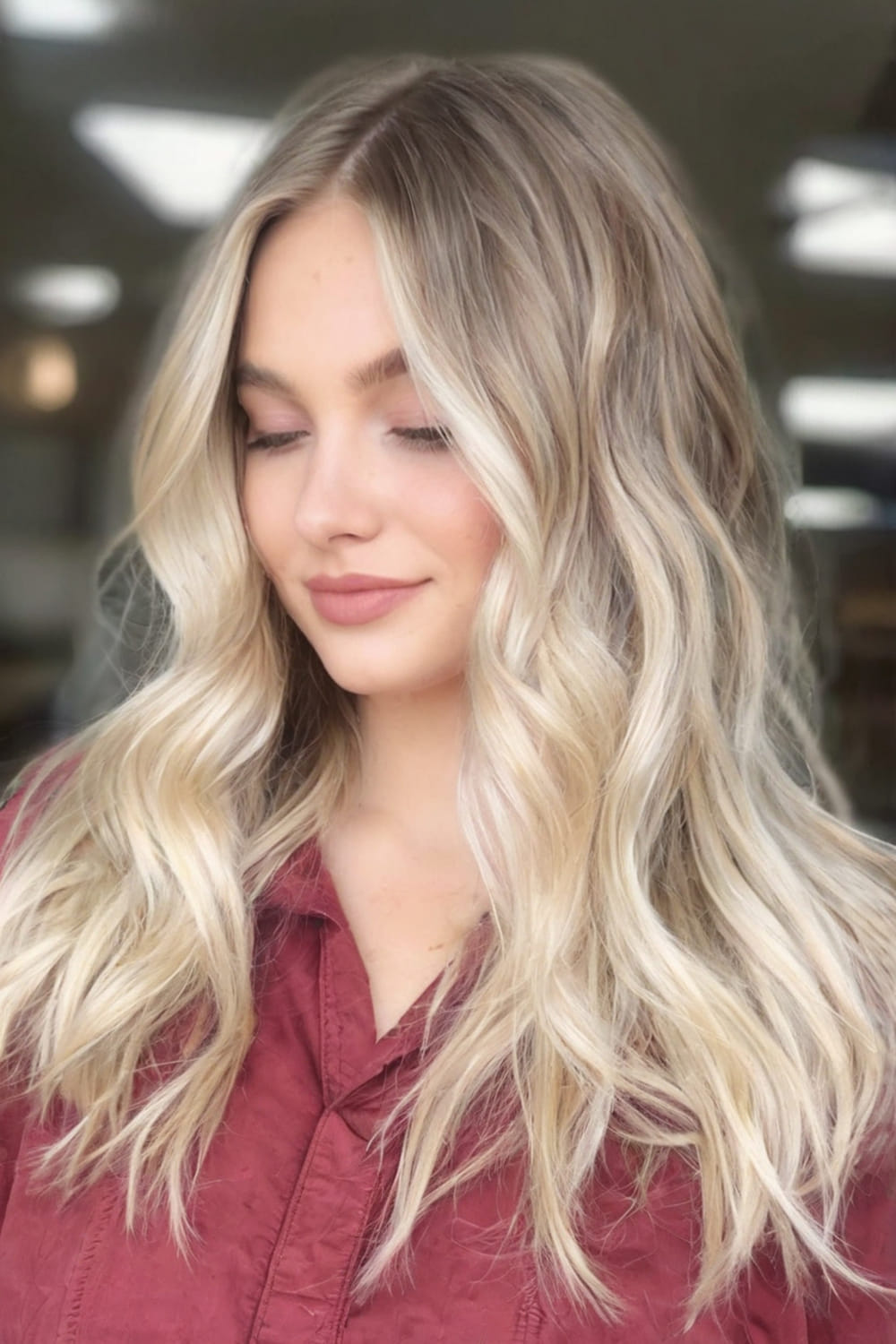 Long Dirty Blonde Balayage with a Side Part