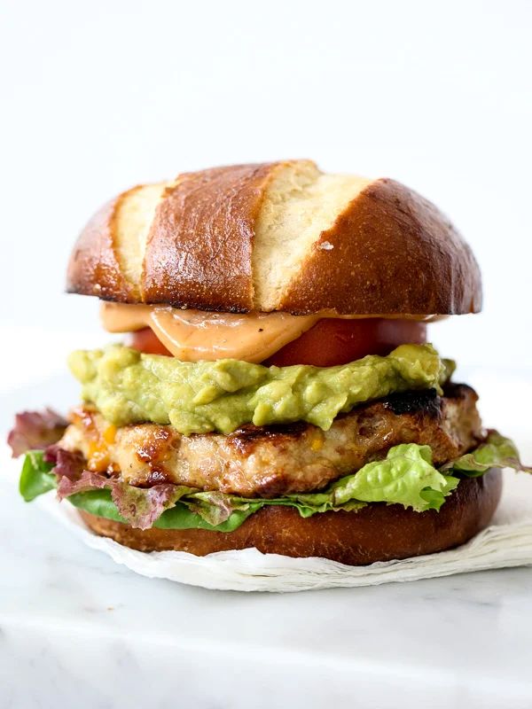 Bacon Cheddar Chicken Burger with Guacamole and BBQ Mayo