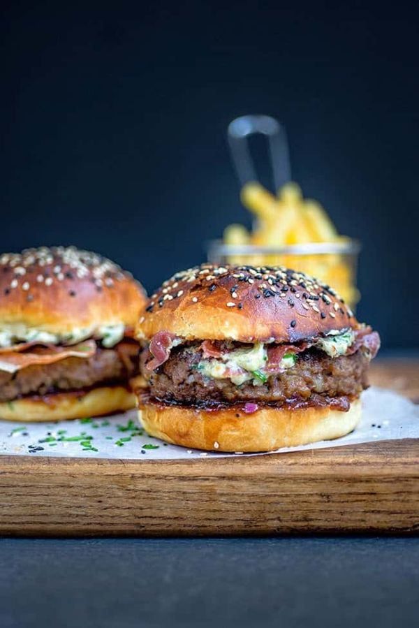 Blue Cheese Burgers on Light Brioche Rolls with Crispy Pancetta and Onion Chutney
