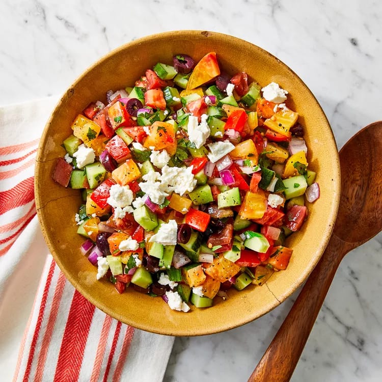 Use a Spoon Chopped Salad with Tomatoes, Cucumber, Red Onion & Kalamata Olives